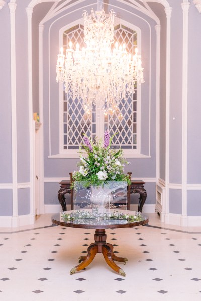 Tiles and table and chandelier