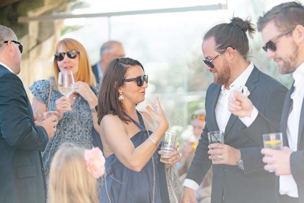 Groom and woman/mother chatting