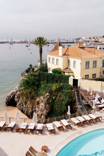 Swimming pool view of wedding venue castle fort resort and sea view