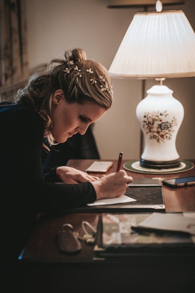 Bride writes down her vows for ceremony