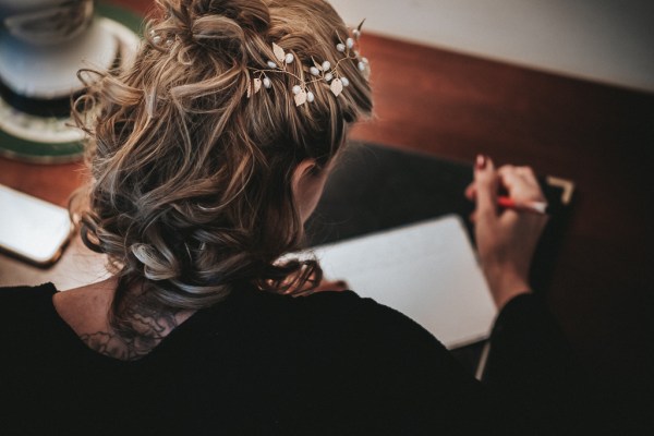 Bride writes down her vows for ceremony