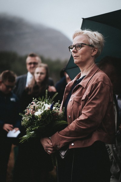 Woman holding bouquet flowers