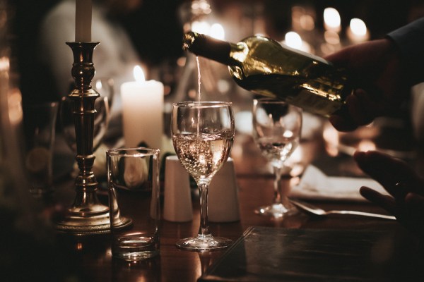 Wine being poured into wine glass white