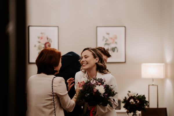 Bride hugs grandmother