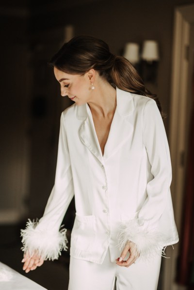 Bride wearing feather bridal loungewear