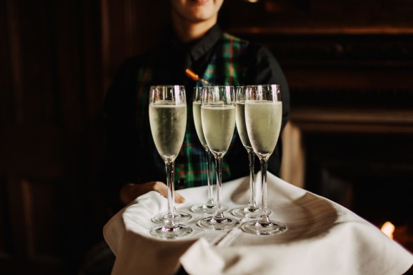 Glasses of prosecco for guests on tray