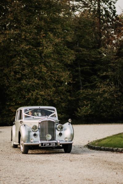 Wedding car approaches wedding venue