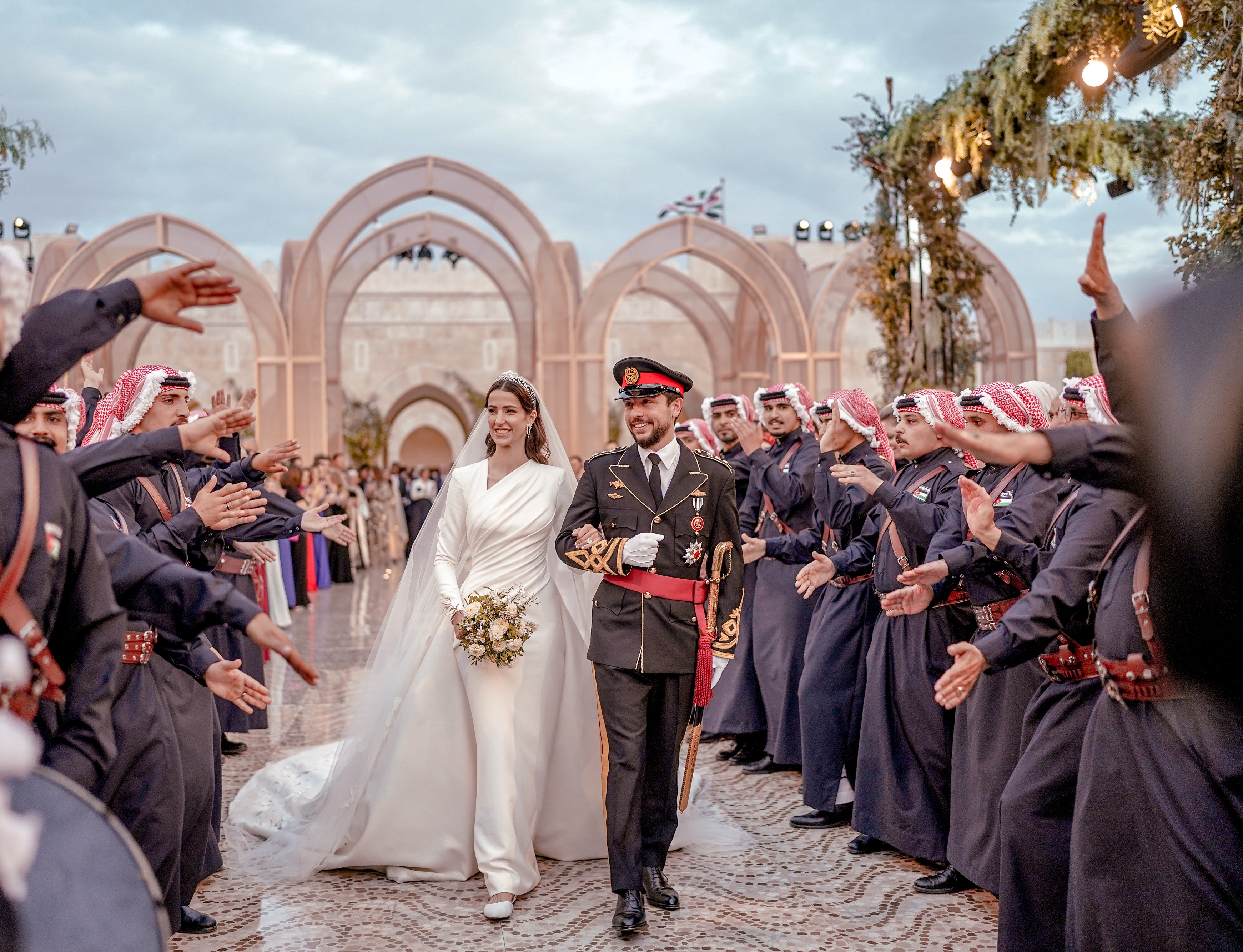 Jordan Crown Prince Al Hussein and Princess Rajwa Al Hussein depart Zahran palace during their wedding on June 01, 2023 in Amman, Jordan