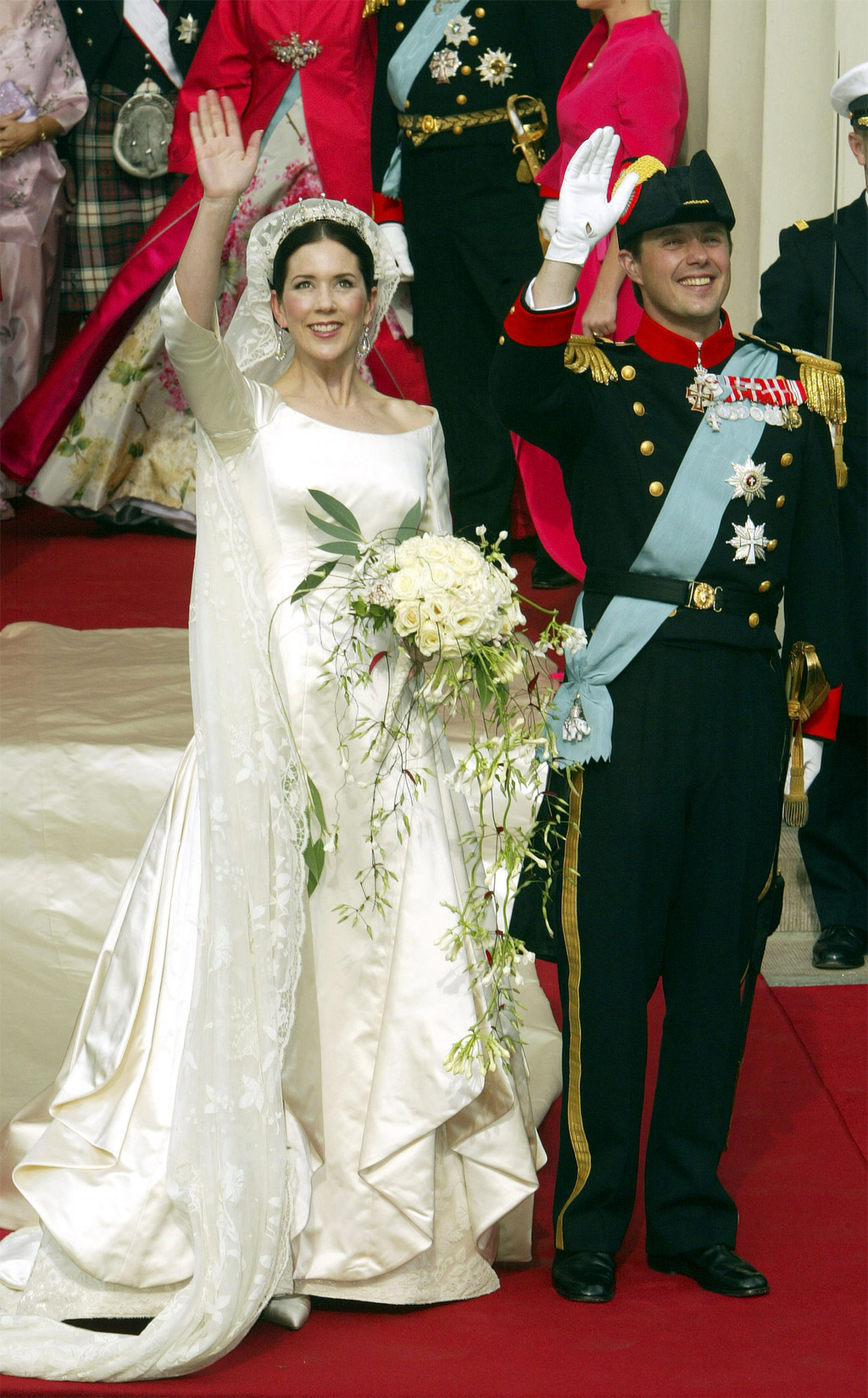 Danish Crown Prince Frederik and his bride Crown Princess Mary leave Copenhagen Cathedral after their wedding ceremony