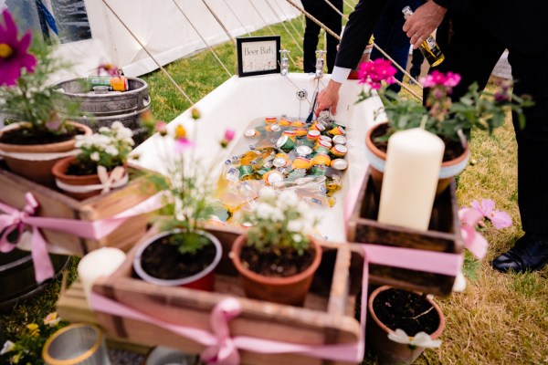 Flower pots and candles in garden