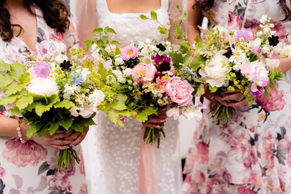 Close up of bride and bridesmaids flowers rose bouquet