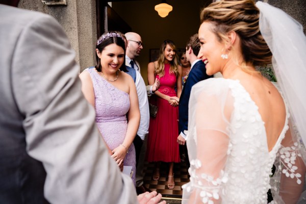 Guests family members chat to bride