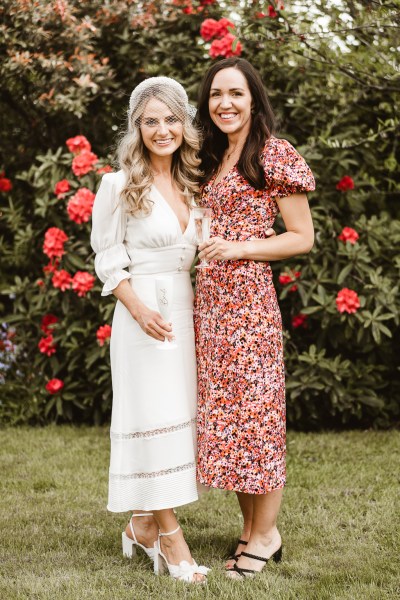 Bride and sister/friend pose for a picture