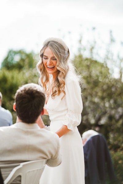 Bride laughs