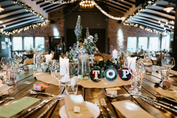 Flowers on table TOP sign and candles lit