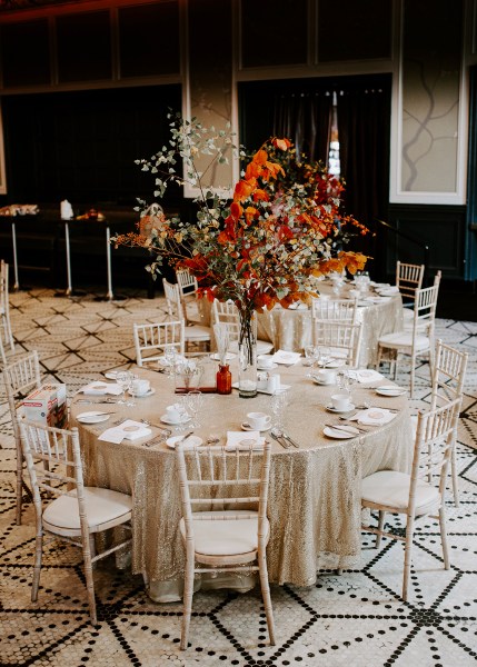 Dining room table and chairs autumnal orange flowers