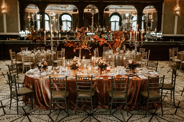 Autumnal setting dining room table and chairs cutlery for guests