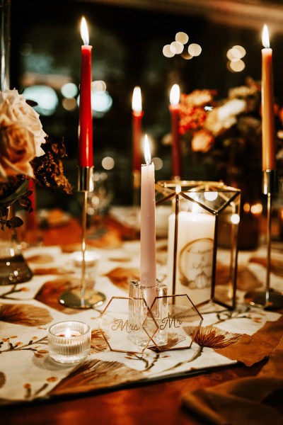 Flowers roses on table candles lighting