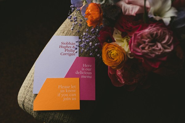 Flowers roses on table along with RSVP cards