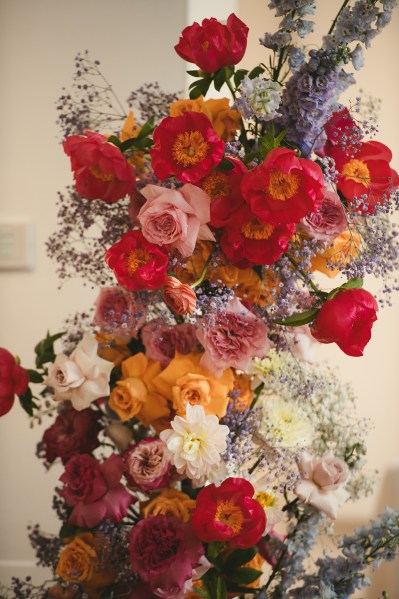 Close up of pink red and orange roses/flowers/bouquet