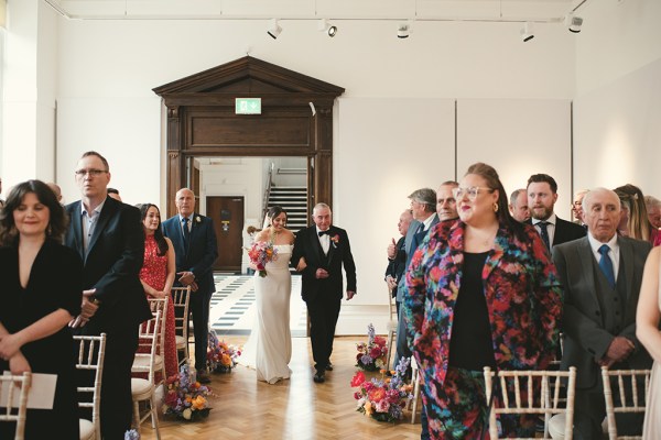 Father of the bride walks her down the aisle