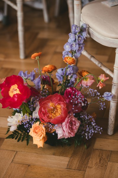 Close up of pink red and orange roses/flowers/bouquet