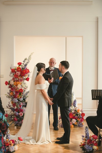 Bride and groom at the alter with celebrant