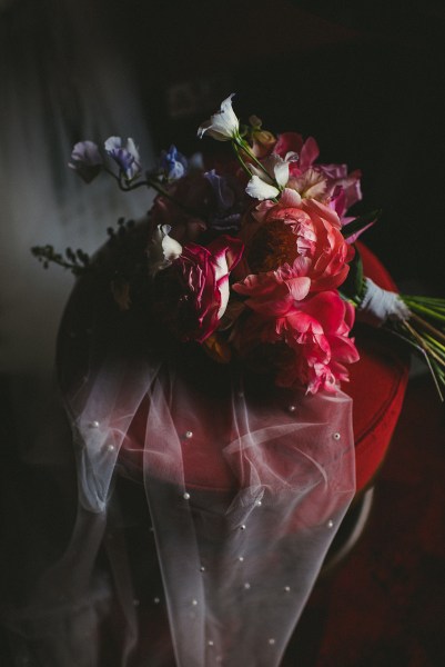 Close up of flowers on red cinema seat