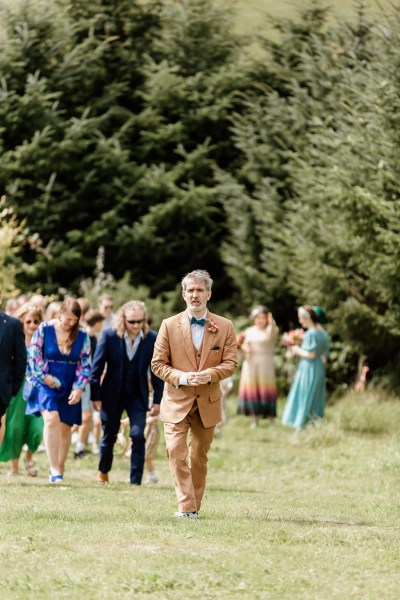 The groom makes his way to ceremony/alter