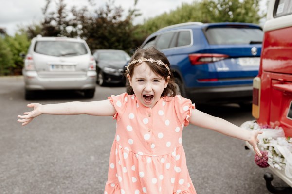 little girl singing celebrating posing for camera