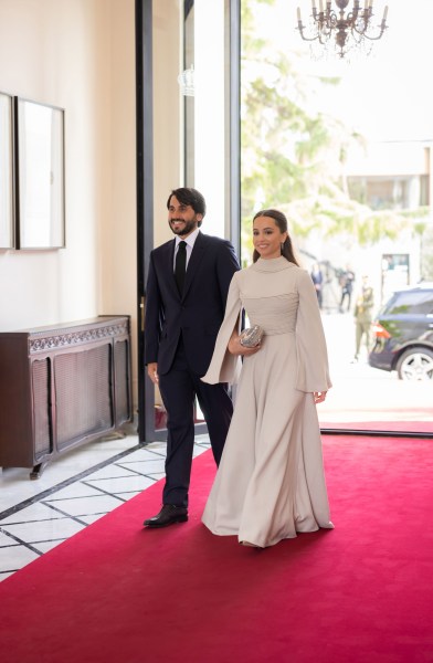 Jordanian princess Iman bint King Abdullah II and her husband New York-Based Financier Jameel Alexander Thermiotis arriving to attend the royal wedding ceremony of Jordanian Crown Prince Hussein