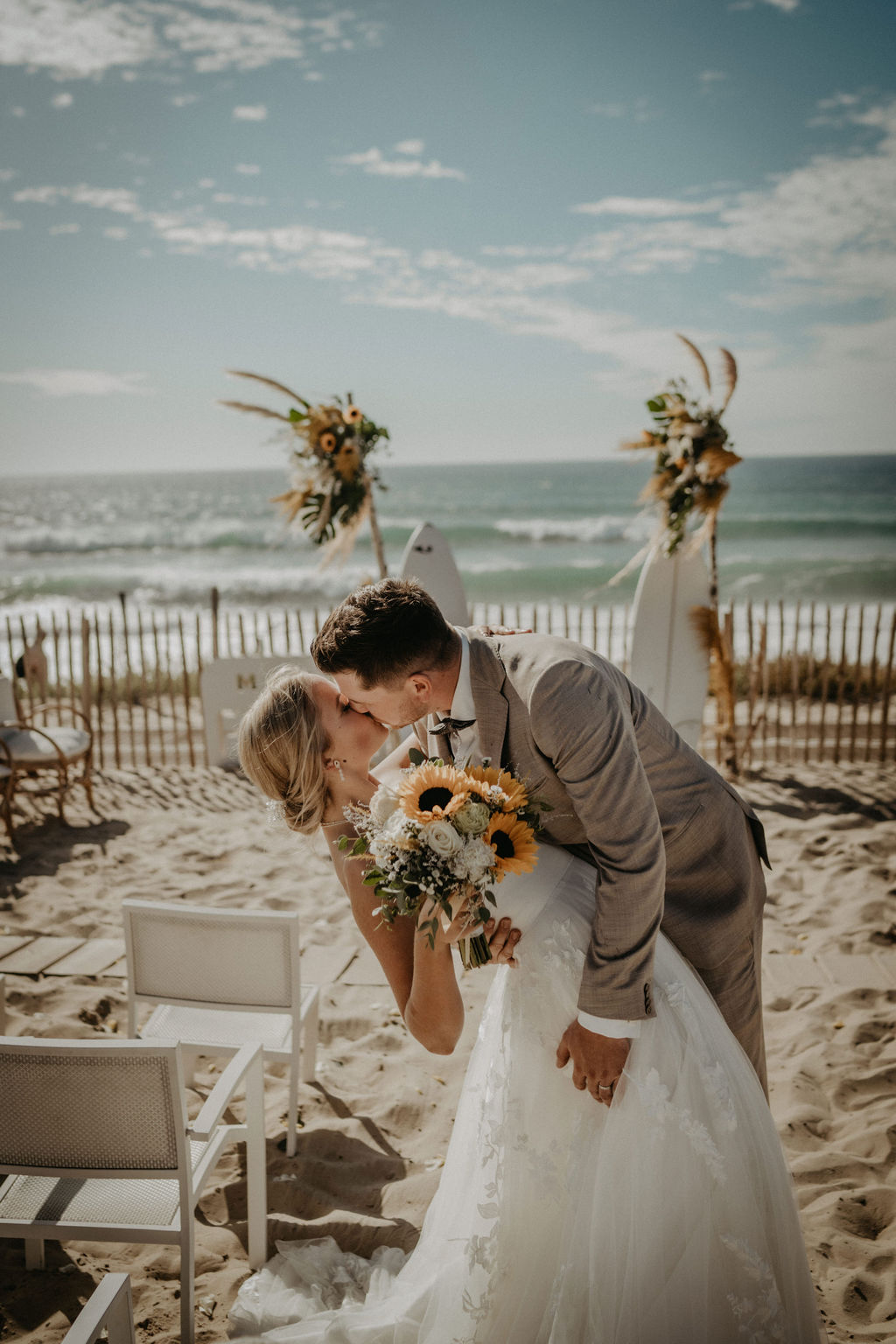 Bride and groom kiss after ceremony ends