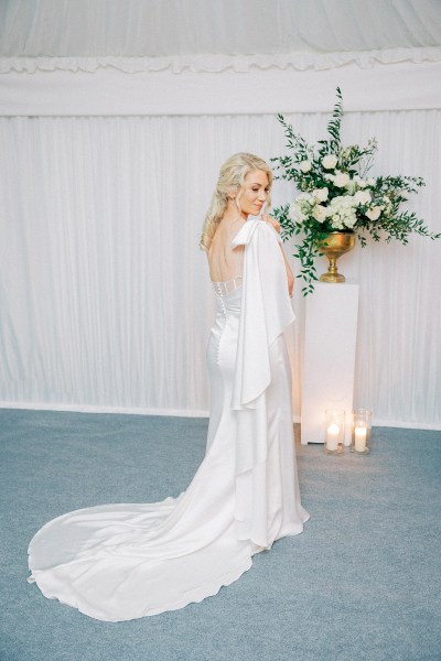 Bride shows off second dress long train