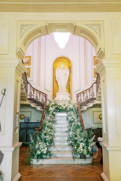 Empty stairwell staircase covered in flowers