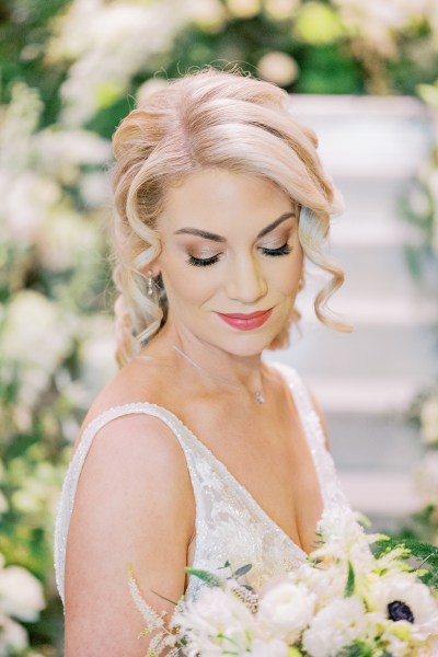 Bride looks down and smile