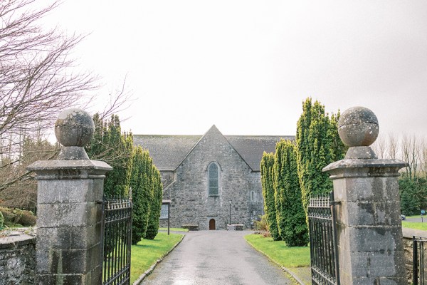 Exterior entrance to wedding venue gate and pathway