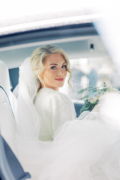 Bride looks over the shoulder