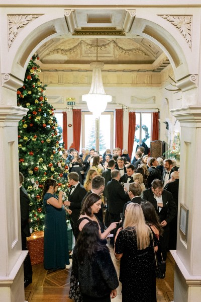 Interior Christmas tree and guests