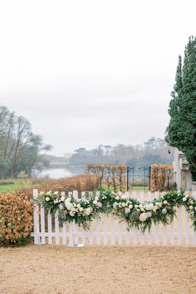 Foggy exterior white flowers on fence