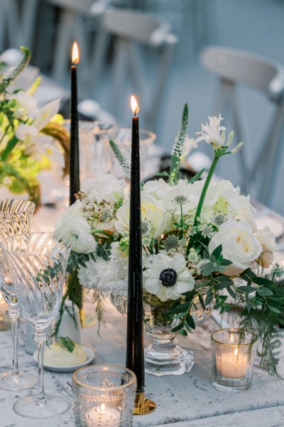 Interior ballroom disco ball dining room area table candles flowers