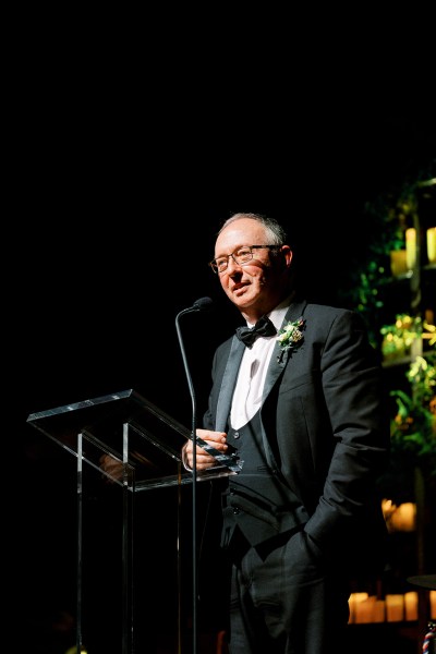 Father gives speech on podium