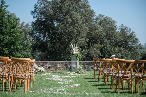 Ceremony setting chairs scenery mountains in background trees