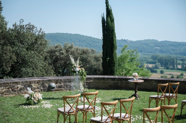 Ceremony setting chairs scenery mountains in background