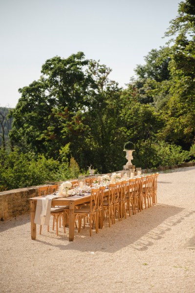 Empty dining room table exterior setting for guests and couple