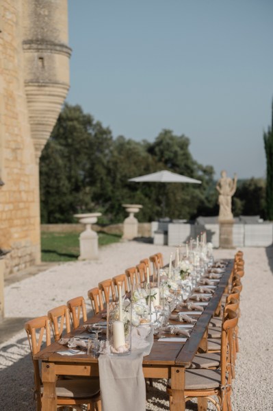 Table dining area trees in background for guests