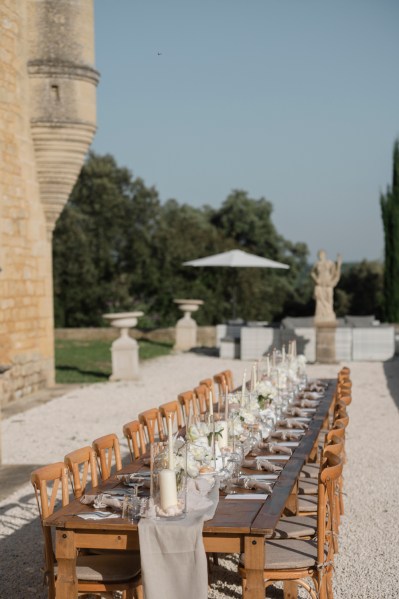 Table dining area trees in background for guests