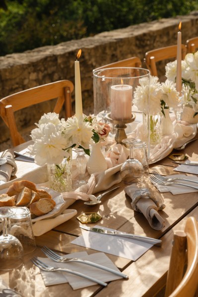 Wooden table name cards material cutlery serviettes and letter