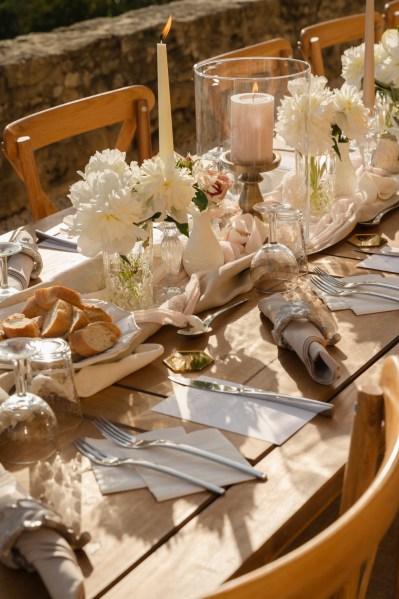 Wooden table name cards material cutlery serviettes and letter