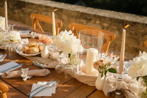 White roses table setting wooden table candles