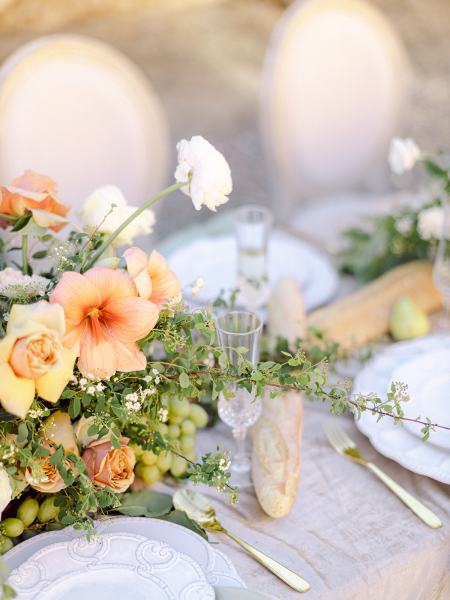 Orange flowers table serviette cutlery on table